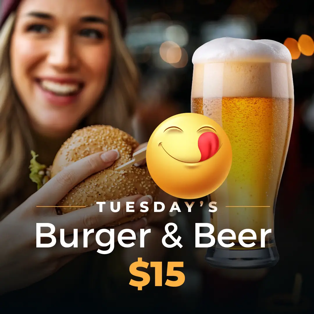 Person having a burger and a beer
